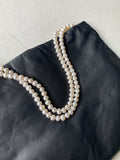 einmalige Handtasche envelope black cream pearls